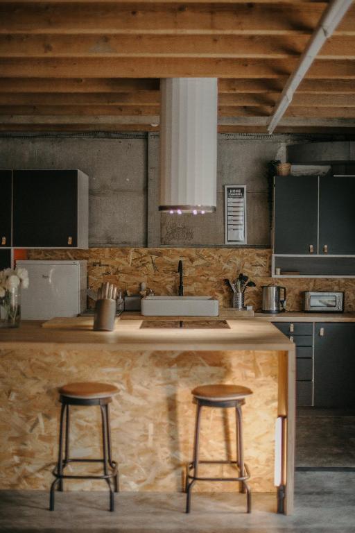 Kuchyňa alebo kuchynka v ubytovaní Grand loft avec Jacuzzi et Home Cinema