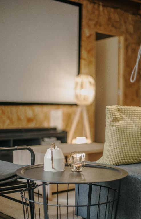 Posedenie v ubytovaní Grand loft avec Jacuzzi et Home Cinema