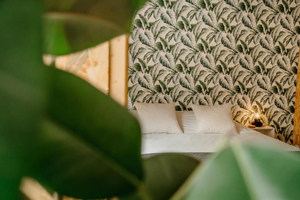 Posteľ alebo postele v izbe v ubytovaní Grand loft avec Jacuzzi et Home Cinema