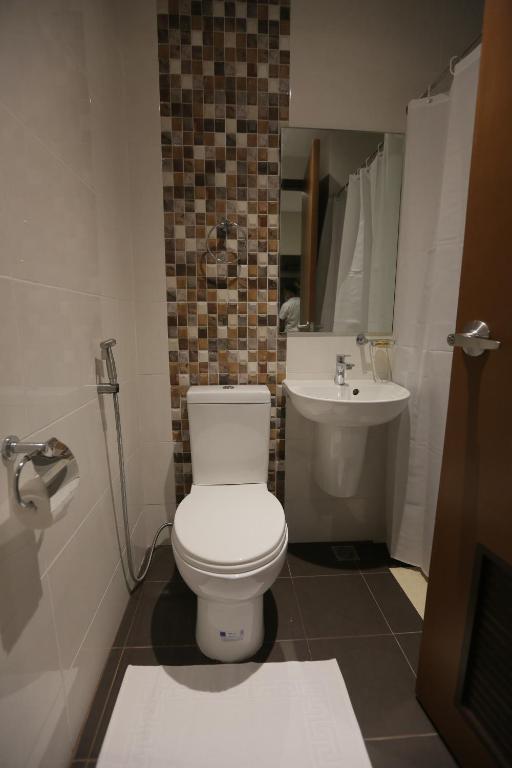 Koupelna v ubytování PILAR MARINA INN