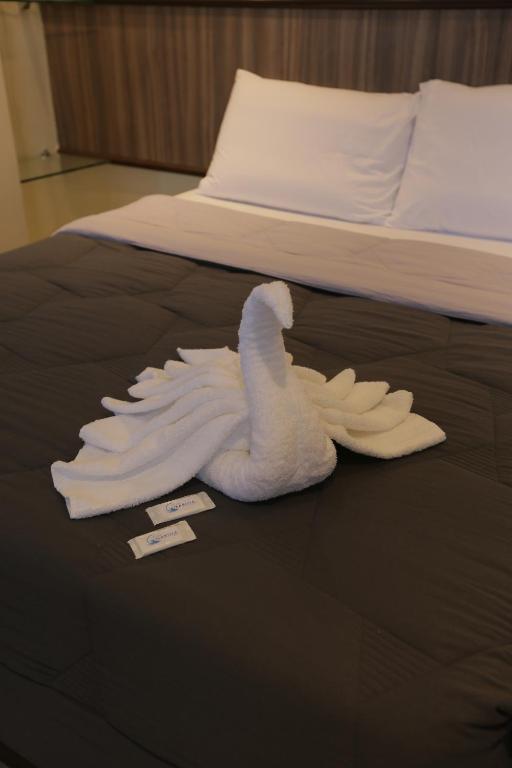 Postel nebo postele na pokoji v ubytování PILAR MARINA INN