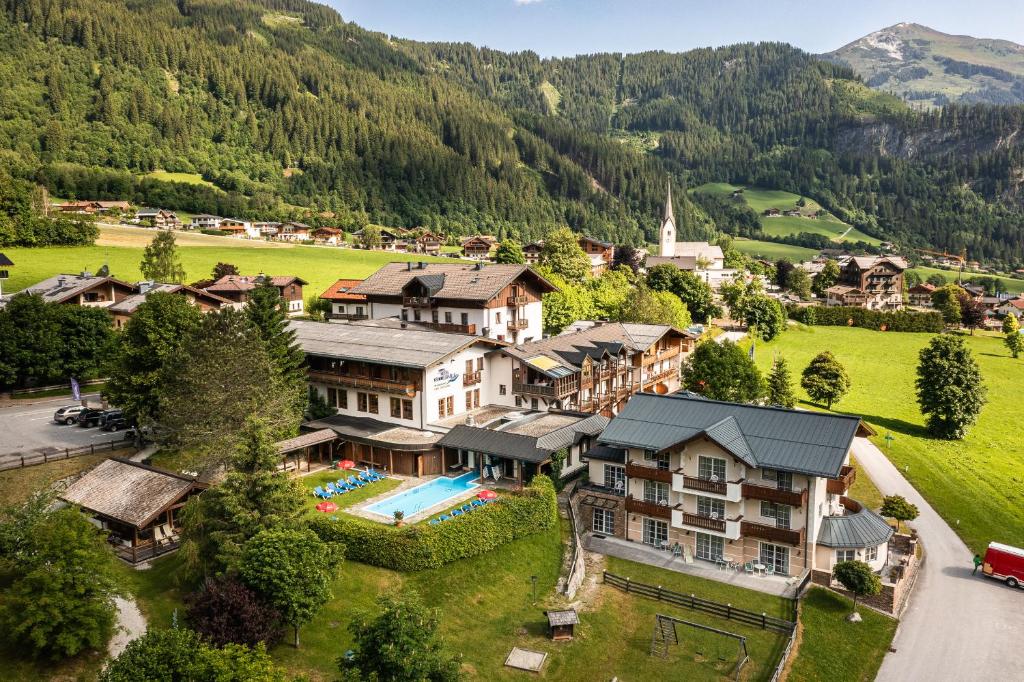 an aerial view of a resort in the mountains at Hotel Krimmlerfälle in Krimml