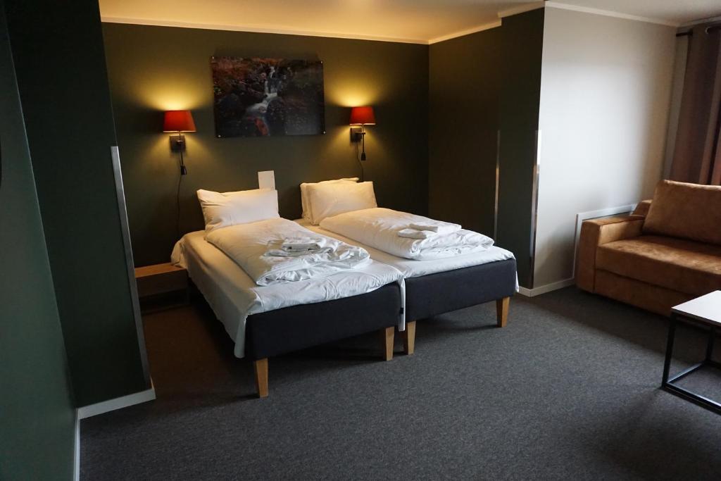 Postel nebo postele na pokoji v ubytování Verdde Hotel Lakselv