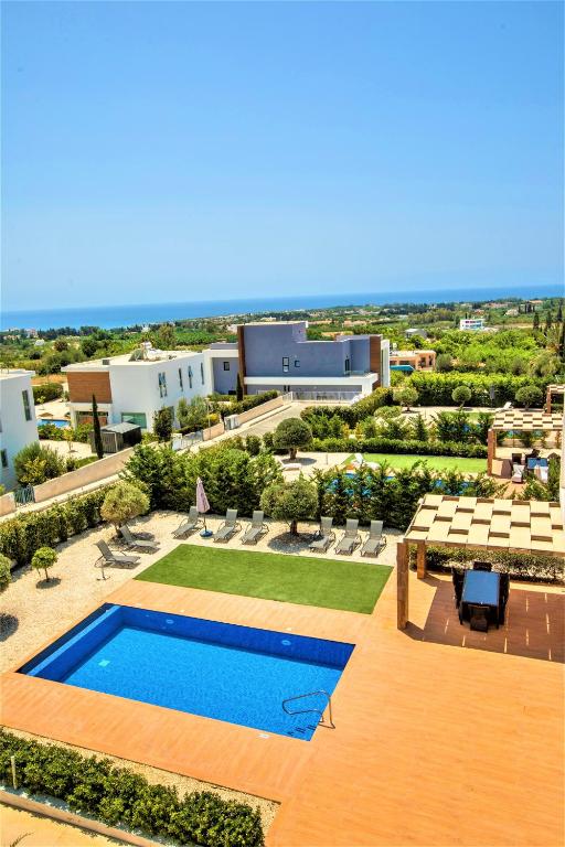 an aerial view of a resort with a swimming pool at Coral Elite Residences in Coral Bay