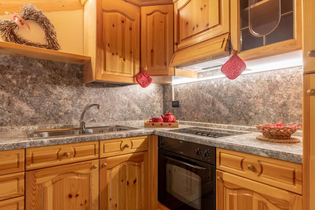 Kuchyň nebo kuchyňský kout v ubytování Residence Stella