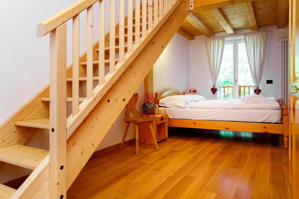 Postel nebo postele na pokoji v ubytování Residence Stella