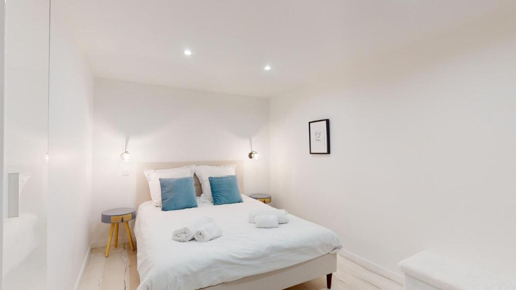 Posteľ alebo postele v izbe v ubytovaní Appartements modernes avec véranda