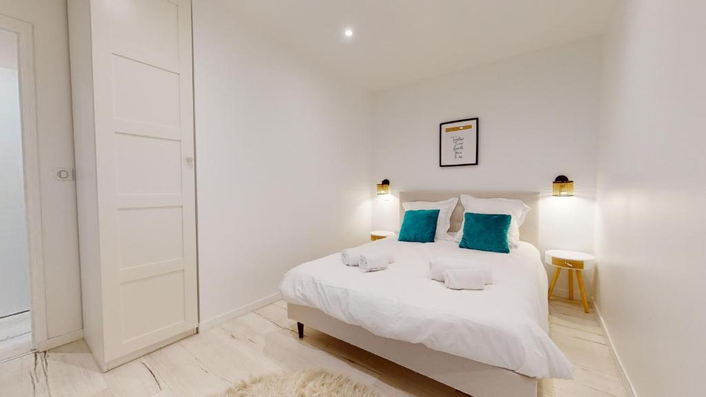 Posteľ alebo postele v izbe v ubytovaní Appartements modernes avec véranda