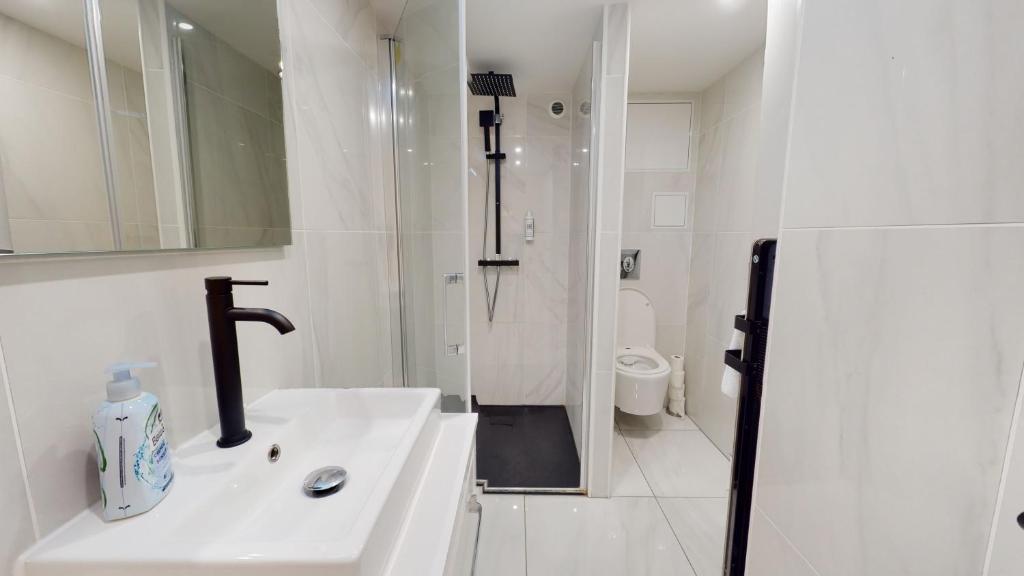 Kúpeľňa v ubytovaní Appartements modernes avec véranda