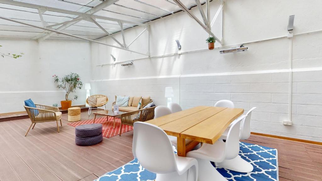 Posedenie v ubytovaní Appartements modernes avec véranda
