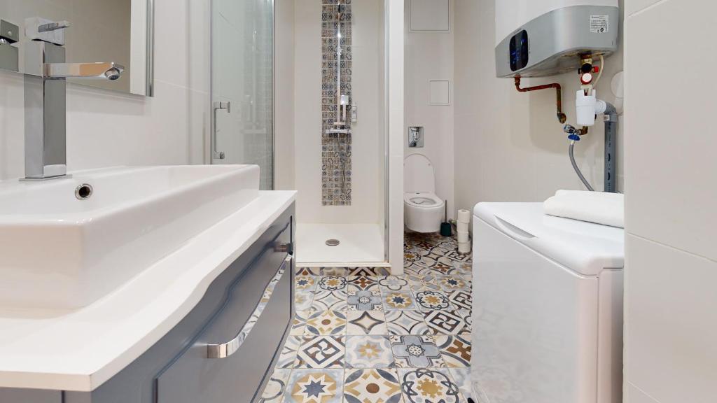 Kúpeľňa v ubytovaní Appartements modernes avec véranda