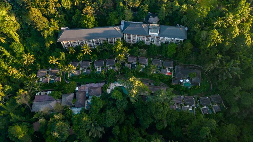 an overhead view of a house in the forest at The Lokha Ubud Resort, Villas & SPA in Ubud