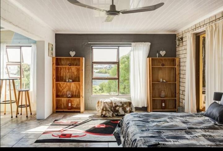 Ένα ή περισσότερα κρεβάτια σε δωμάτιο στο Visvanger self catering