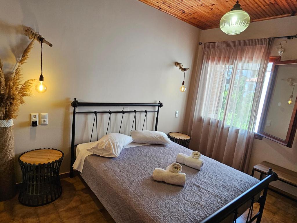 Postel nebo postele na pokoji v ubytování Corali rooms pelion