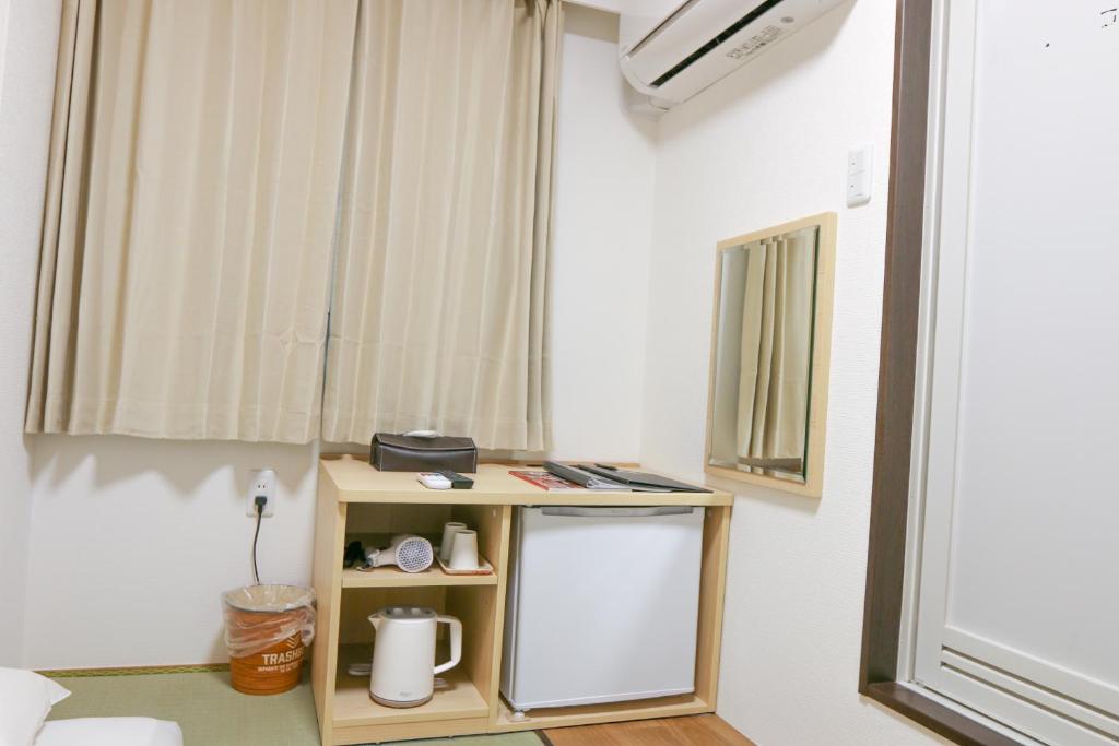 Kuchyň nebo kuchyňský kout v ubytování Hotel Shin-Imamiya