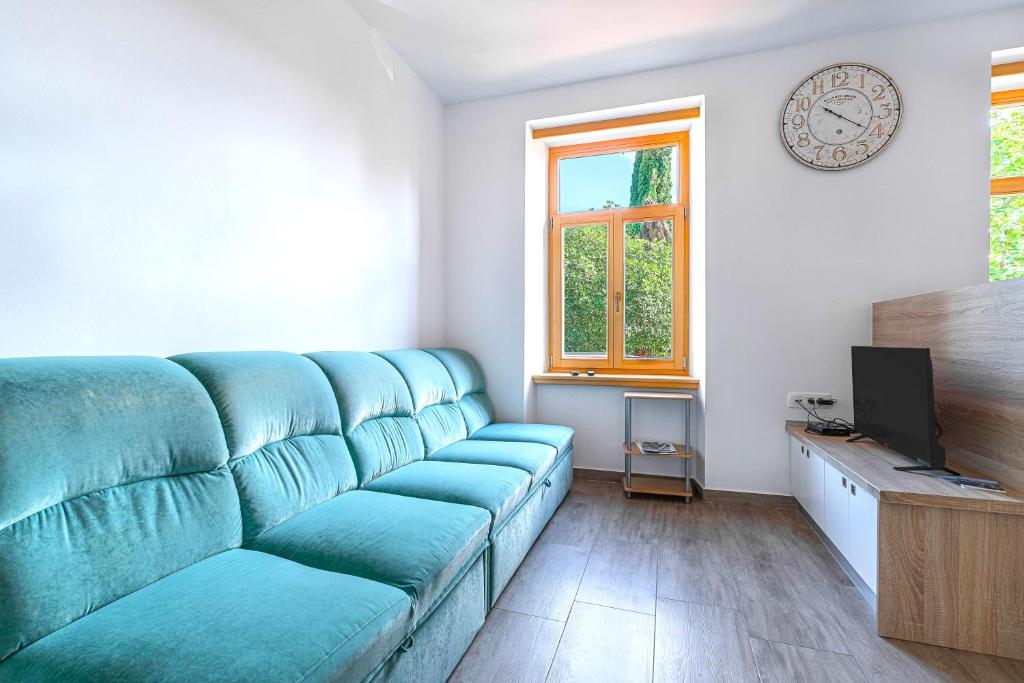 TV a/nebo společenská místnost v ubytování Villa Roma Portorose
