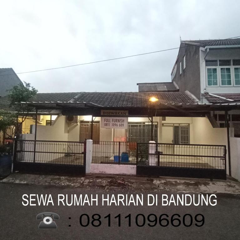 a house with a sign in front of it at Sewa Rumah Harian 3 BR di Bandung,Kiaracondong in Bandung
