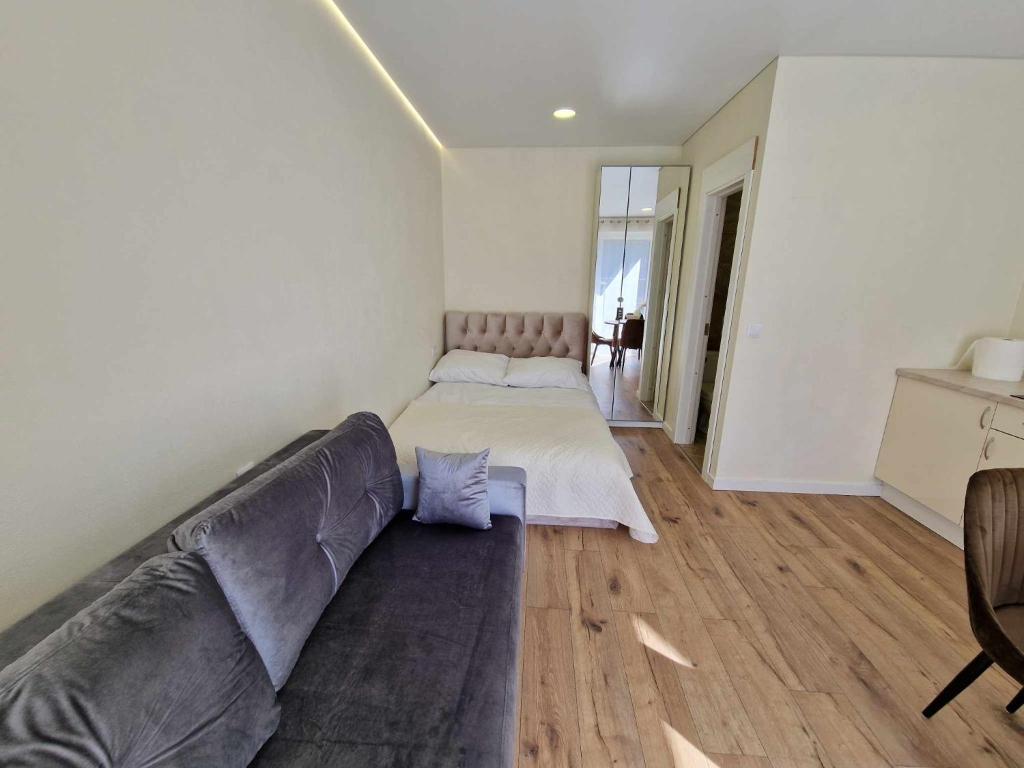 Кровать или кровати в номере 2rest