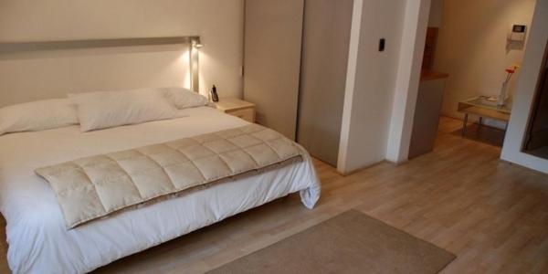 Postel nebo postele na pokoji v ubytování Hotel Piedraluna