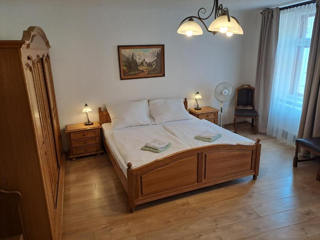 Postel nebo postele na pokoji v ubytování Řehořův dům