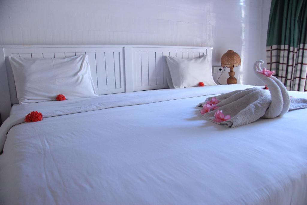 Uma cama ou camas num quarto em Dream CoWork Hotel