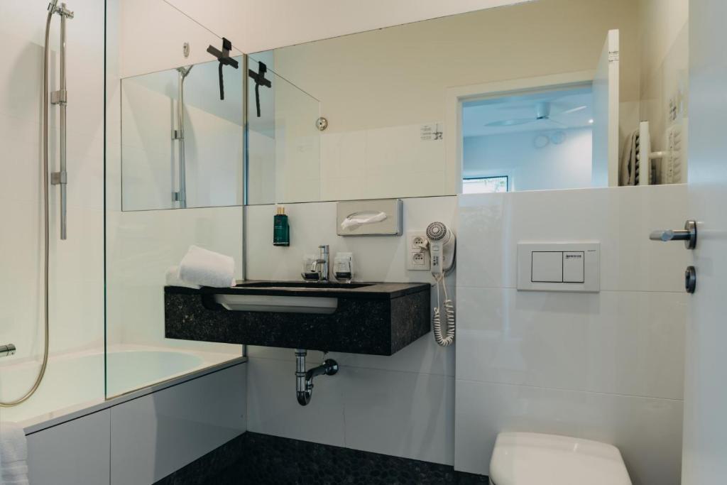 Un baño de Hotel Astoria Gent