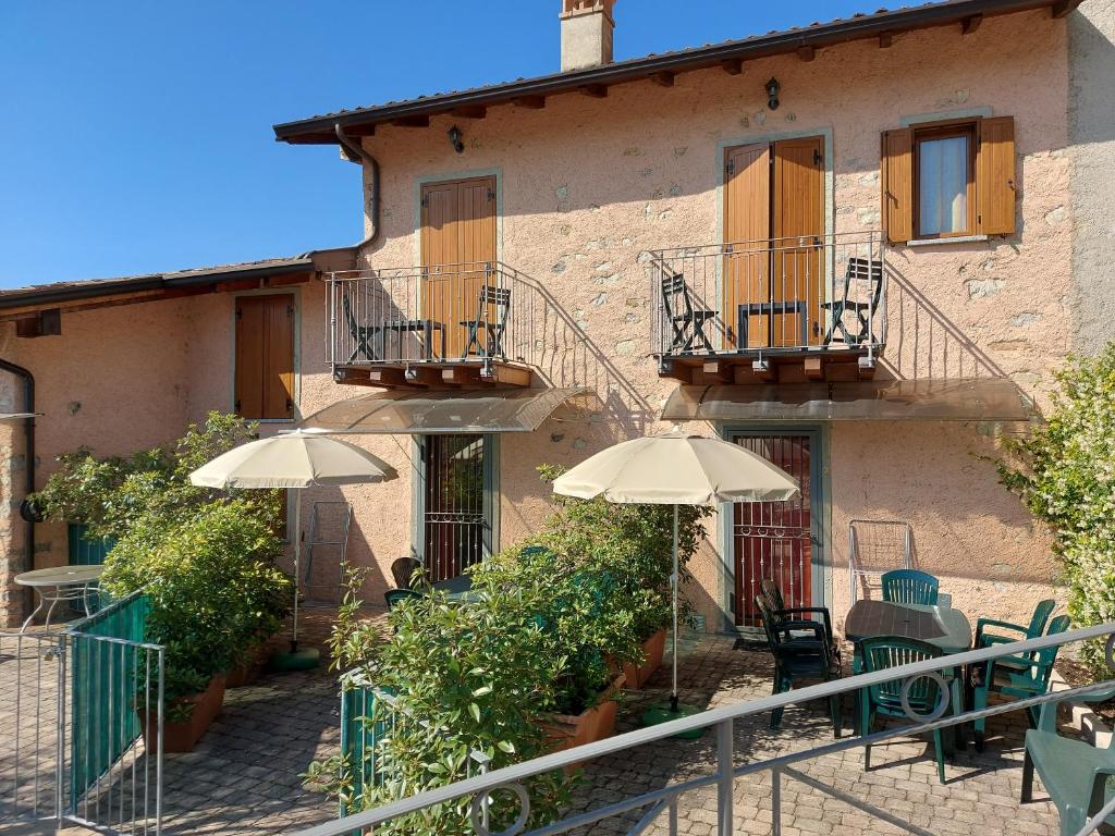 Balkón nebo terasa v ubytování Ulivi sul Garda Garden by Gardadomusmea