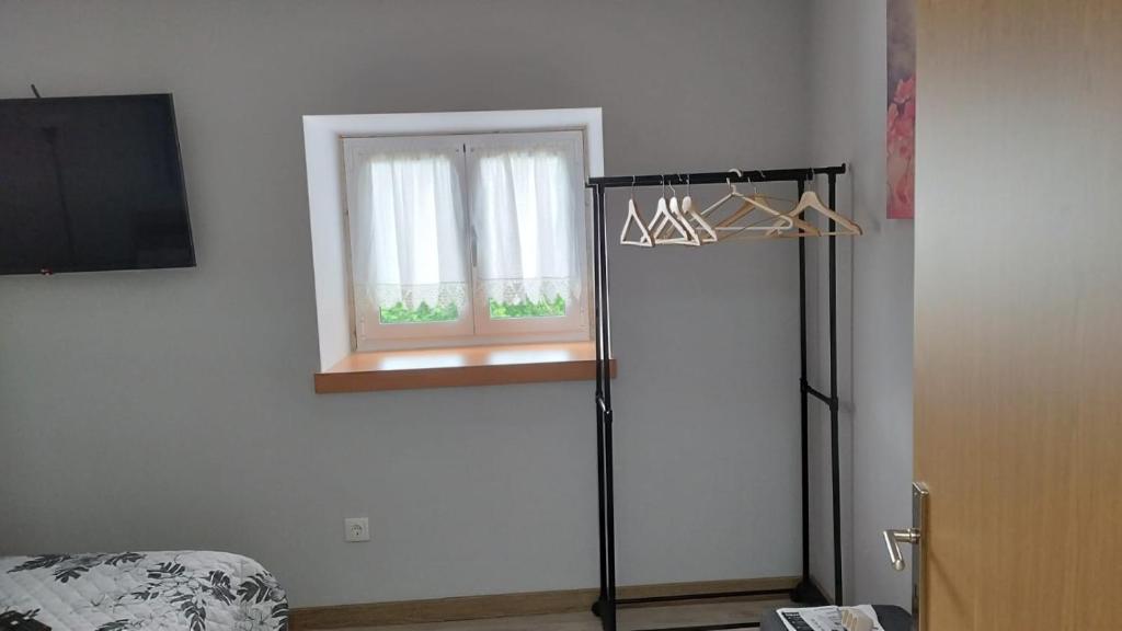 TV a/nebo společenská místnost v ubytování Casa dos Devezas