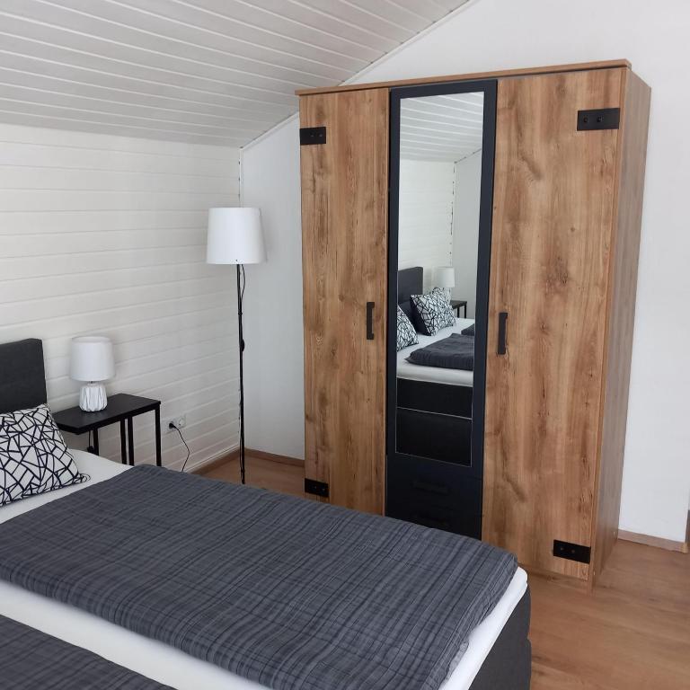 Katil atau katil-katil dalam bilik di Ferienwohnung Heinzelfrauchen