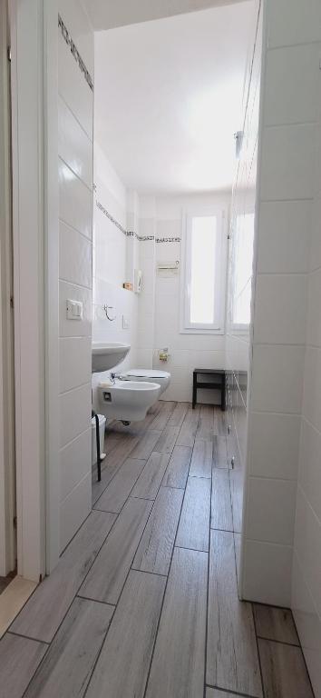 Koupelna v ubytování Hotel Sasselli