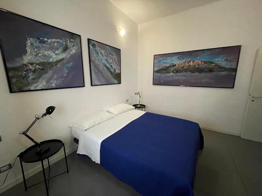 Łóżko lub łóżka w pokoju w obiekcie Milano Canal Apartments