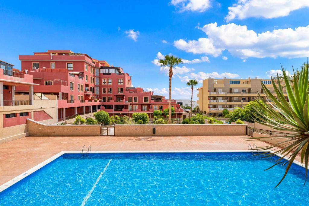 Bazén v ubytovaní MEDANO4YOU The Terrace Holiday Home alebo v jeho blízkosti