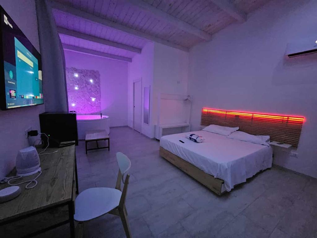 Postel nebo postele na pokoji v ubytování Pool Suite - Città Bianca