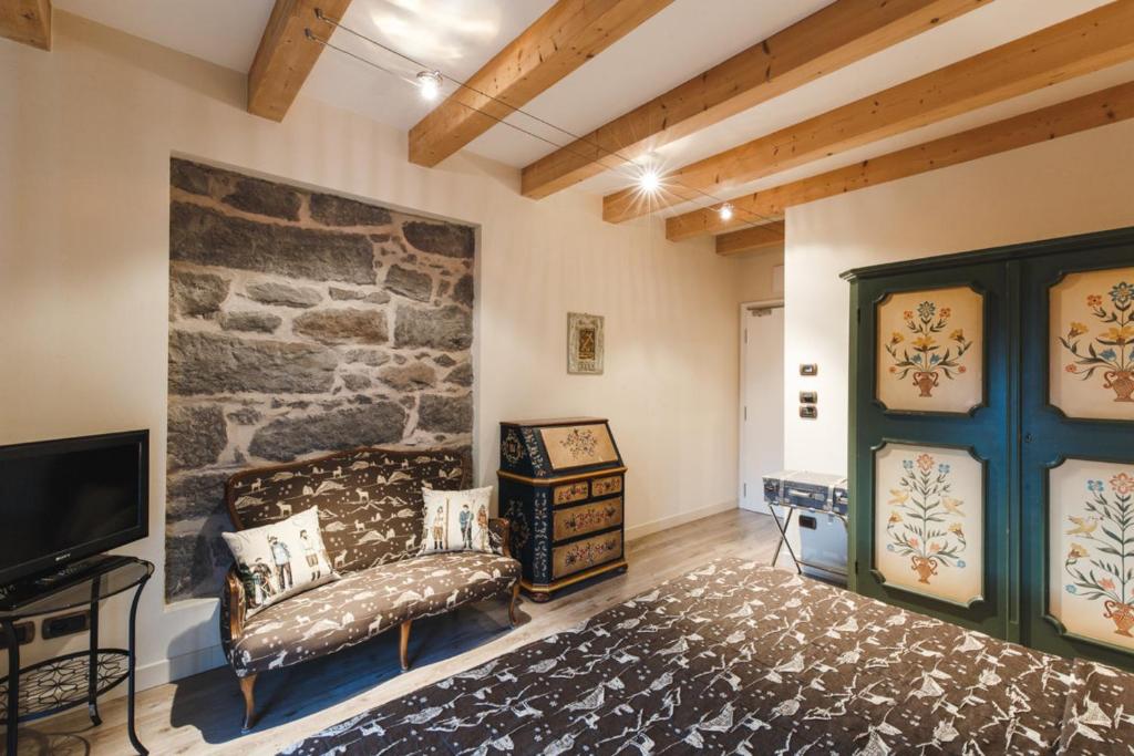 TV a/nebo společenská místnost v ubytování Hotel Savoia dal 1924