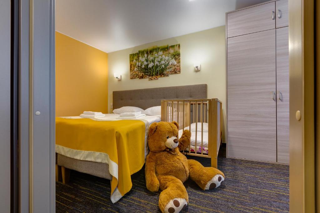 Postel nebo postele na pokoji v ubytování Liivarand Hotel