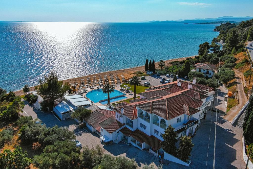 an aerial view of a house and the ocean at Acrotel Lilyann Boutique Hotel in Elia