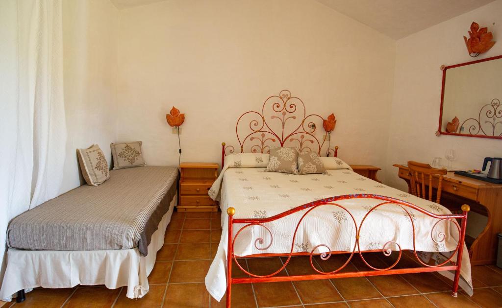 Letto o letti in una camera di Turismo Rurale CUDACCIOLU