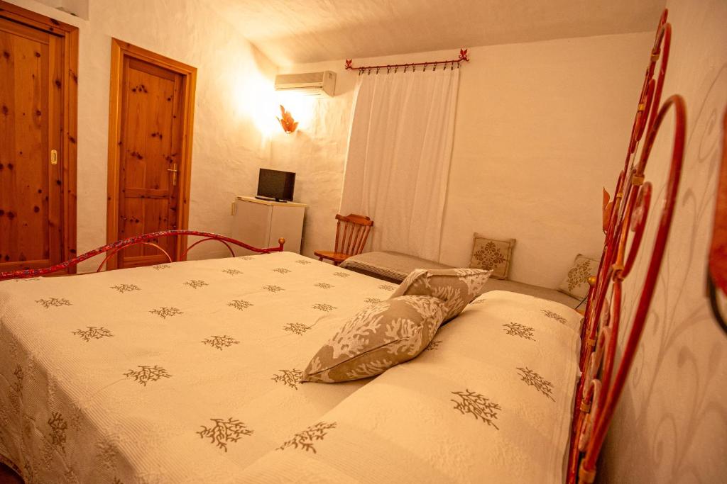 Letto o letti in una camera di Turismo Rurale CUDACCIOLU