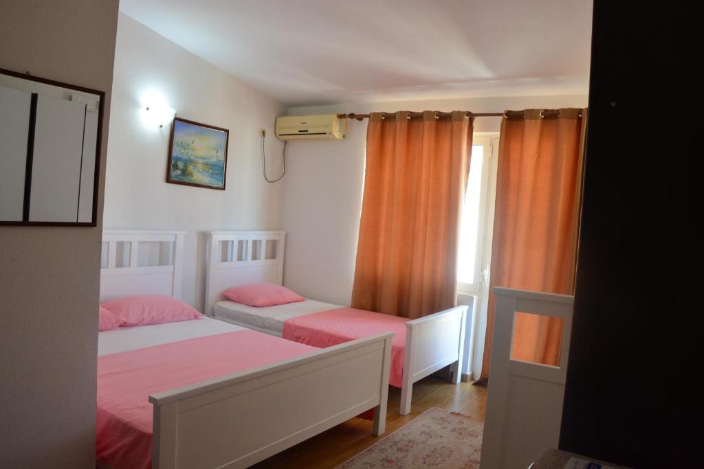 Postel nebo postele na pokoji v ubytování Guest House Vera