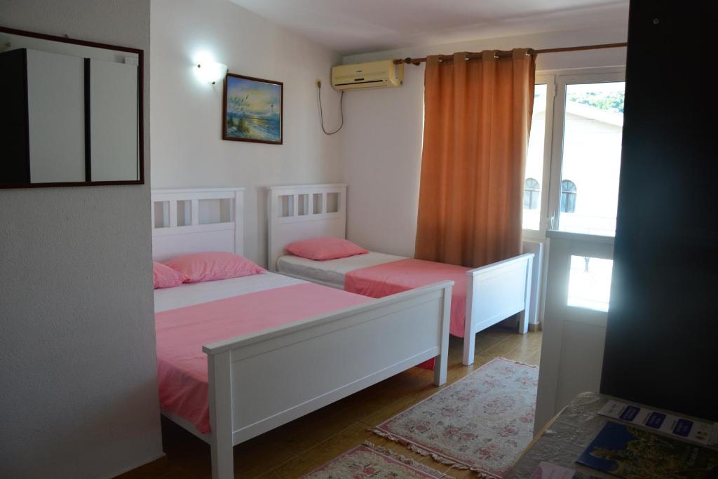 Postel nebo postele na pokoji v ubytování Guest House Vera