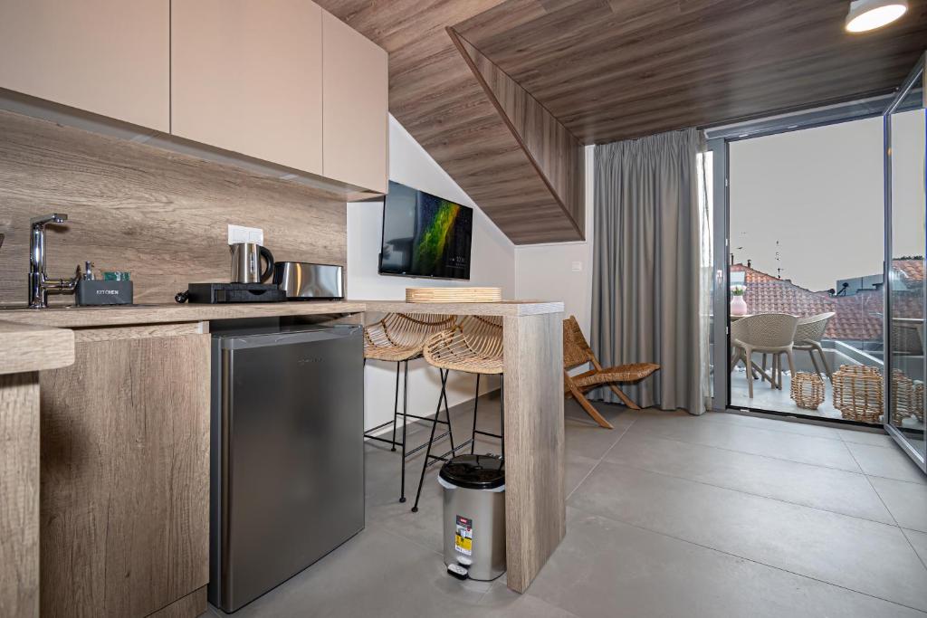 Kuchyň nebo kuchyňský kout v ubytování Evitel Luxury Living