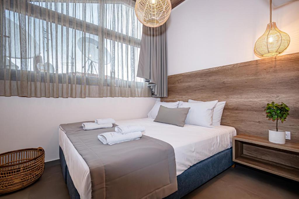Postel nebo postele na pokoji v ubytování Evitel Luxury Living