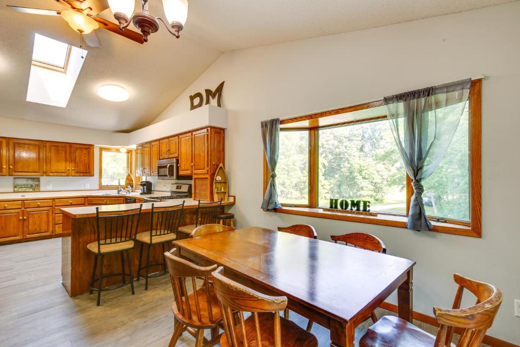 A restaurant or other place to eat at Faribault Home with Deck Near Cedar Lake Boat Ramp!