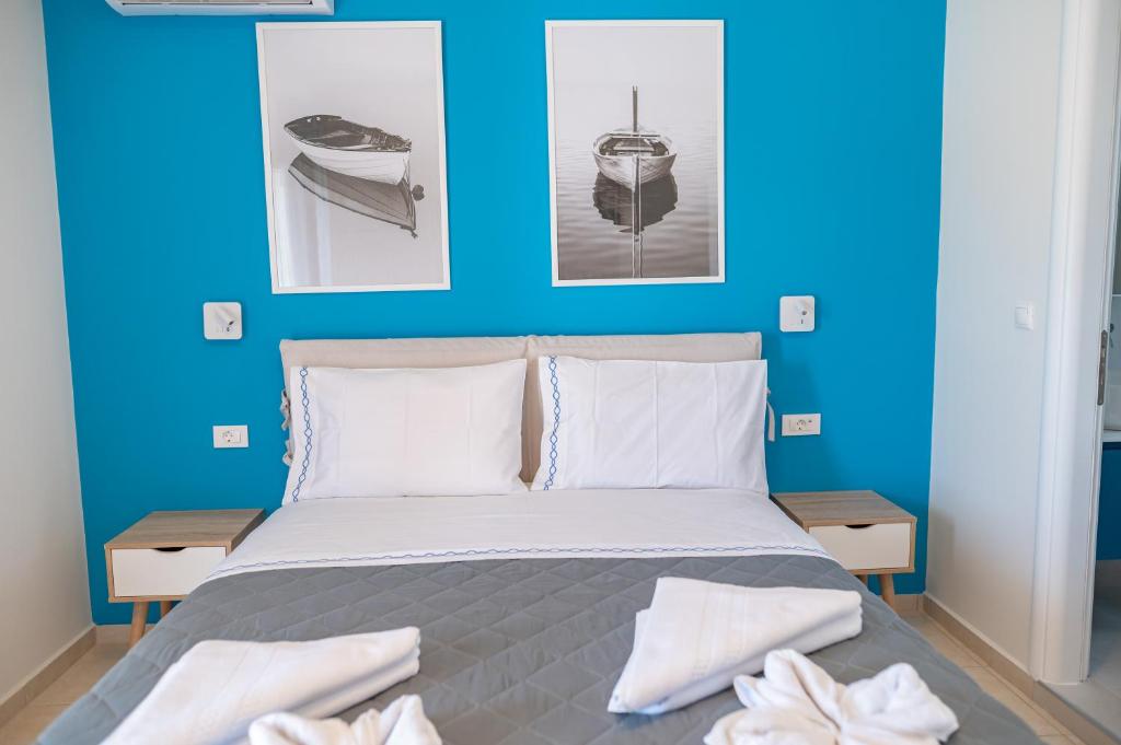 Postel nebo postele na pokoji v ubytování Villa Eos Mastichari - with heated pool