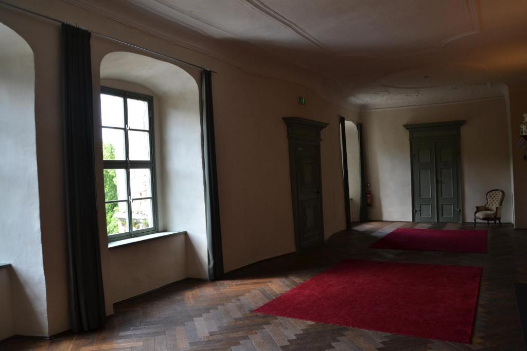 Postel nebo postele na pokoji v ubytování Schloss Gröbitz