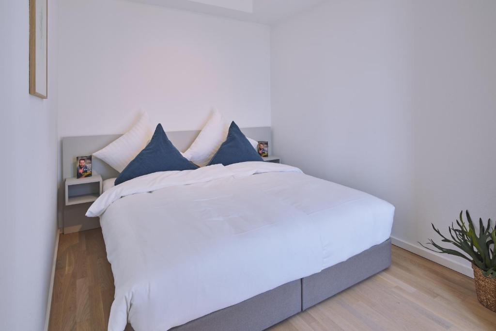 Postel nebo postele na pokoji v ubytování Lüttjeod Apartmentvilla Lüttjeod Apartmentvilla 08