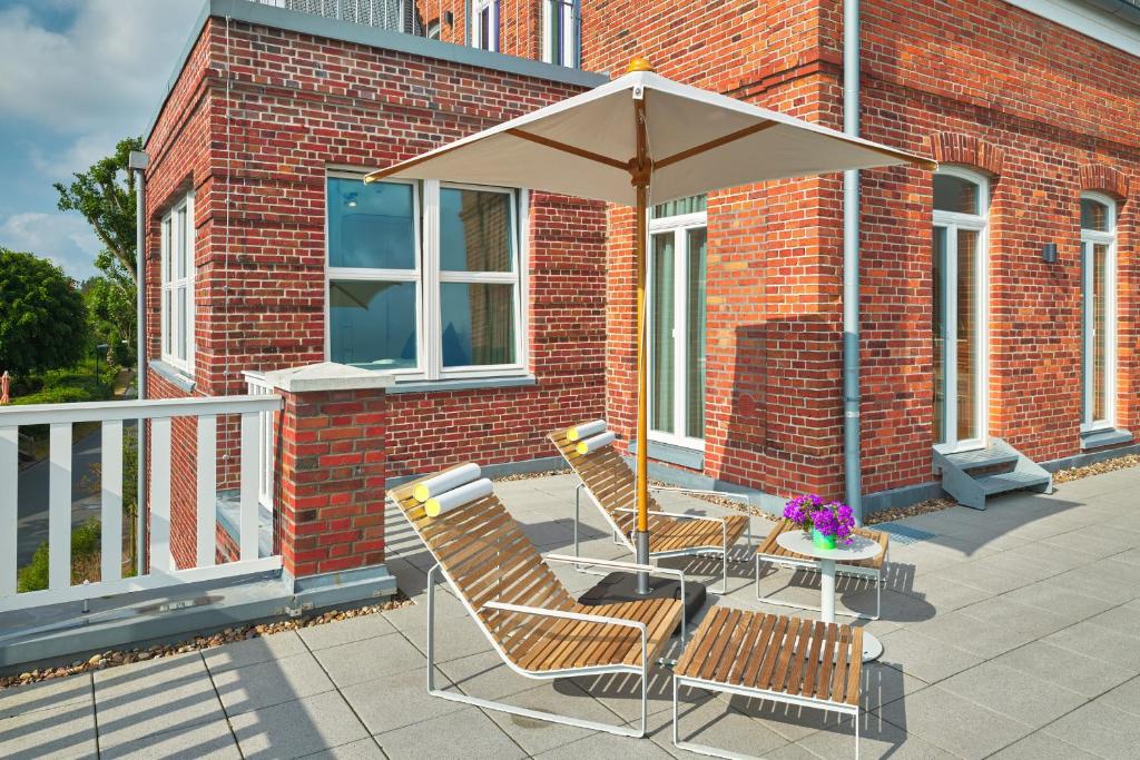 Balkón nebo terasa v ubytování Lüttjeod Apartmentvilla Lüttjeod Apartmentvilla 08
