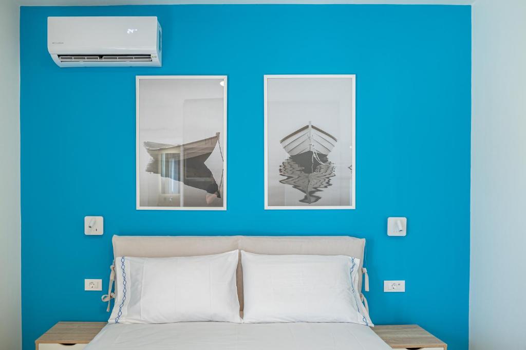 Postel nebo postele na pokoji v ubytování Villa Eos Mastichari - with heated pool