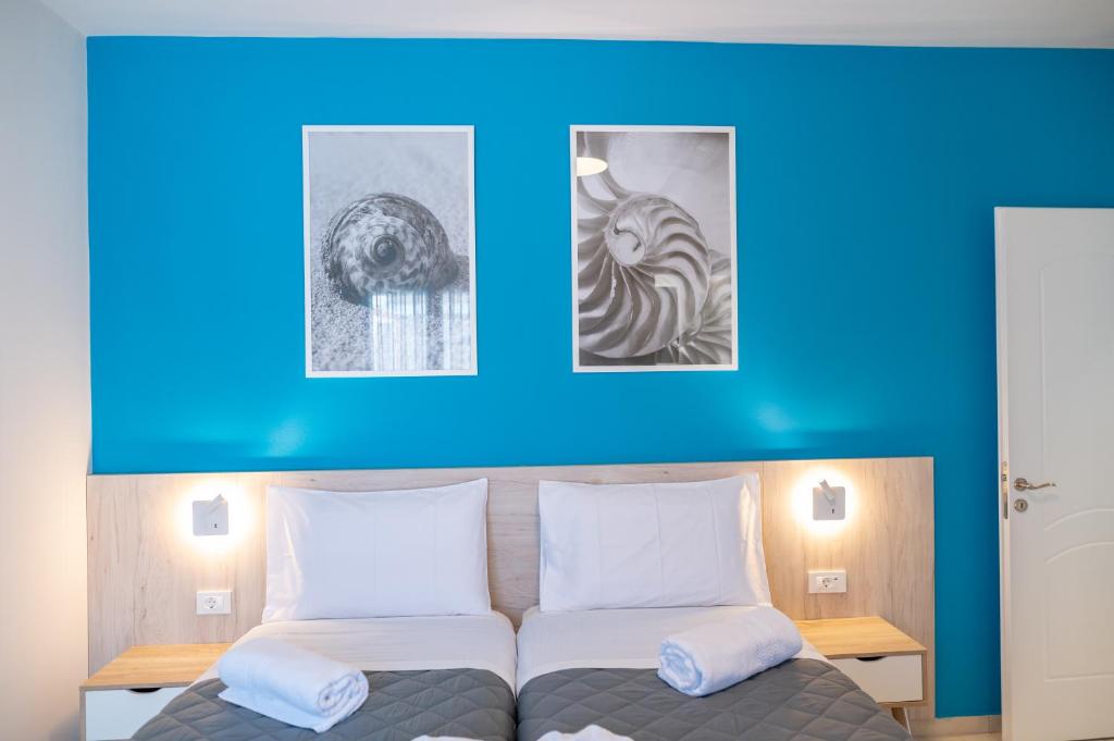 Postel nebo postele na pokoji v ubytování Villa Eos Mastichari - with heated pool