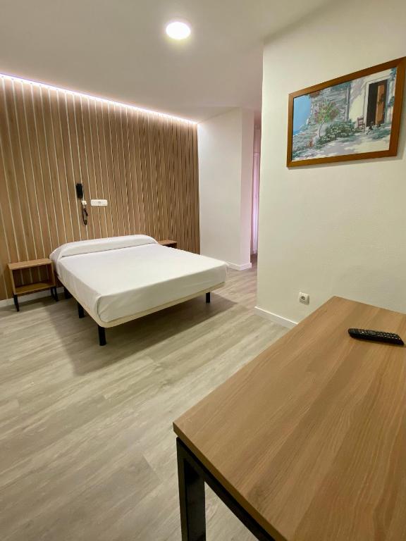 Postel nebo postele na pokoji v ubytování Hotel Victoria Centro
